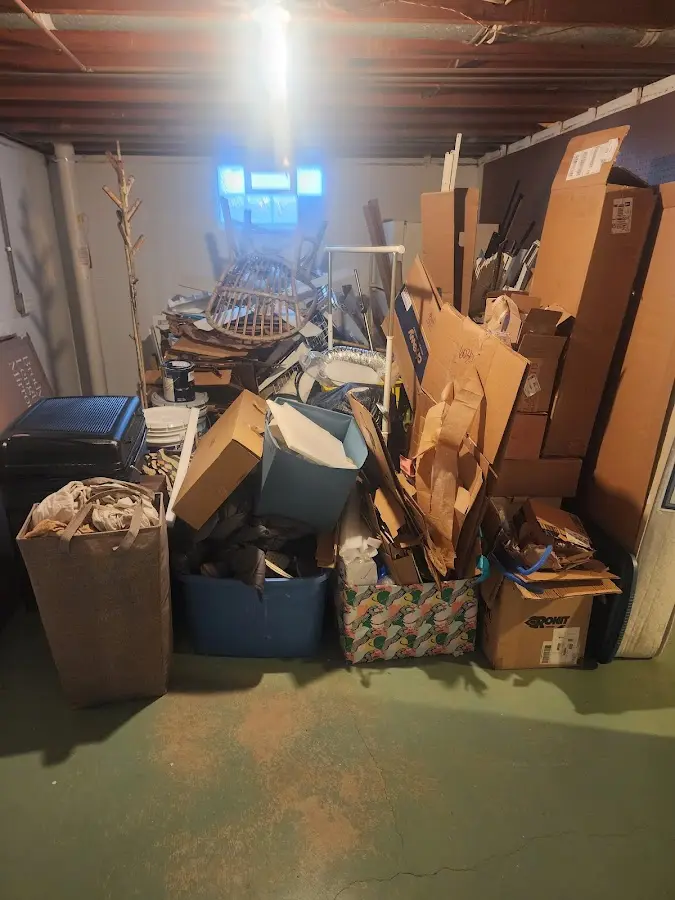 Roll-off dumpster container at job site for 8 Yard Dumpster Rental in Burgaw